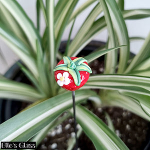 Glass Strawberry with a little flower